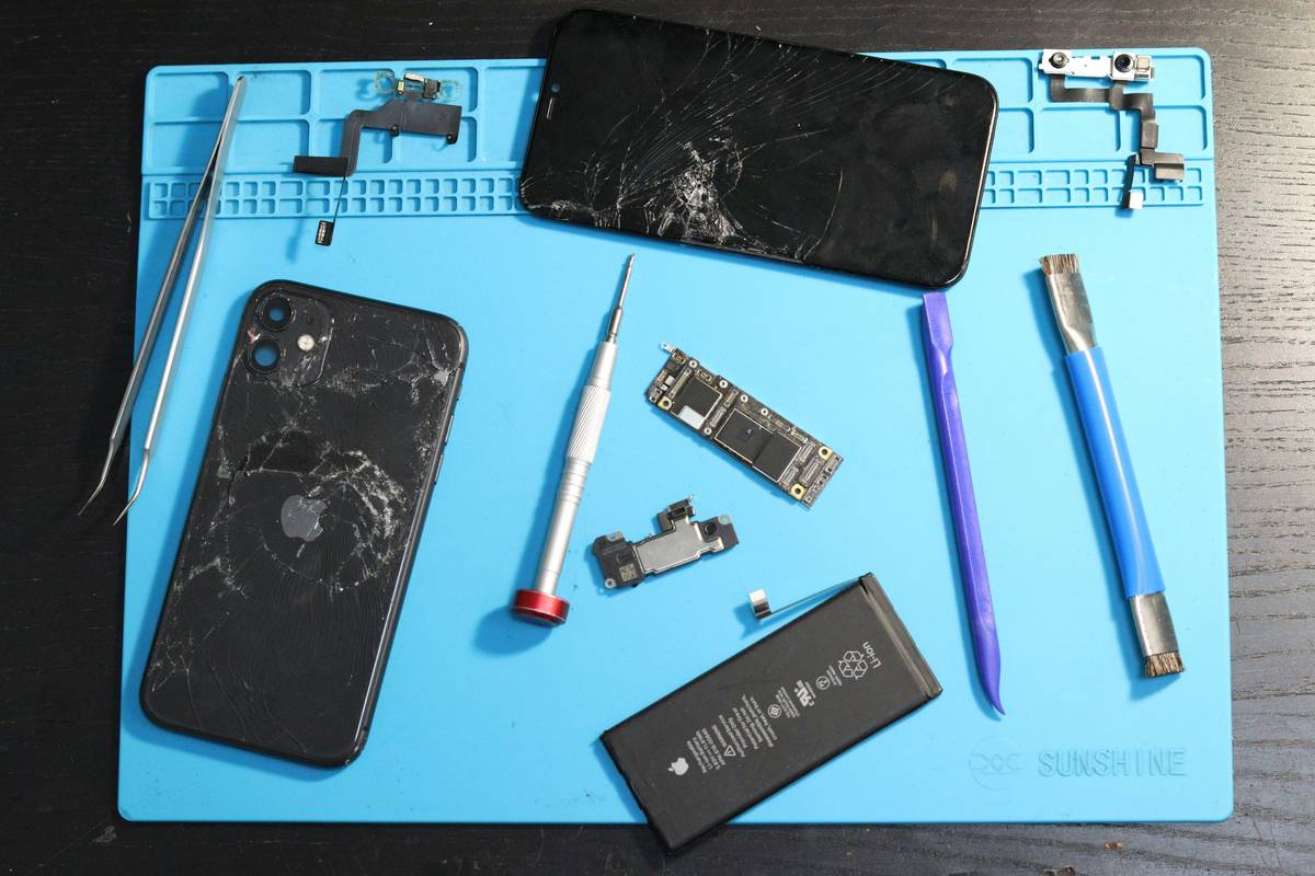 repair tool ultimate guide to home featuring essential hand tools laid out on a workbench